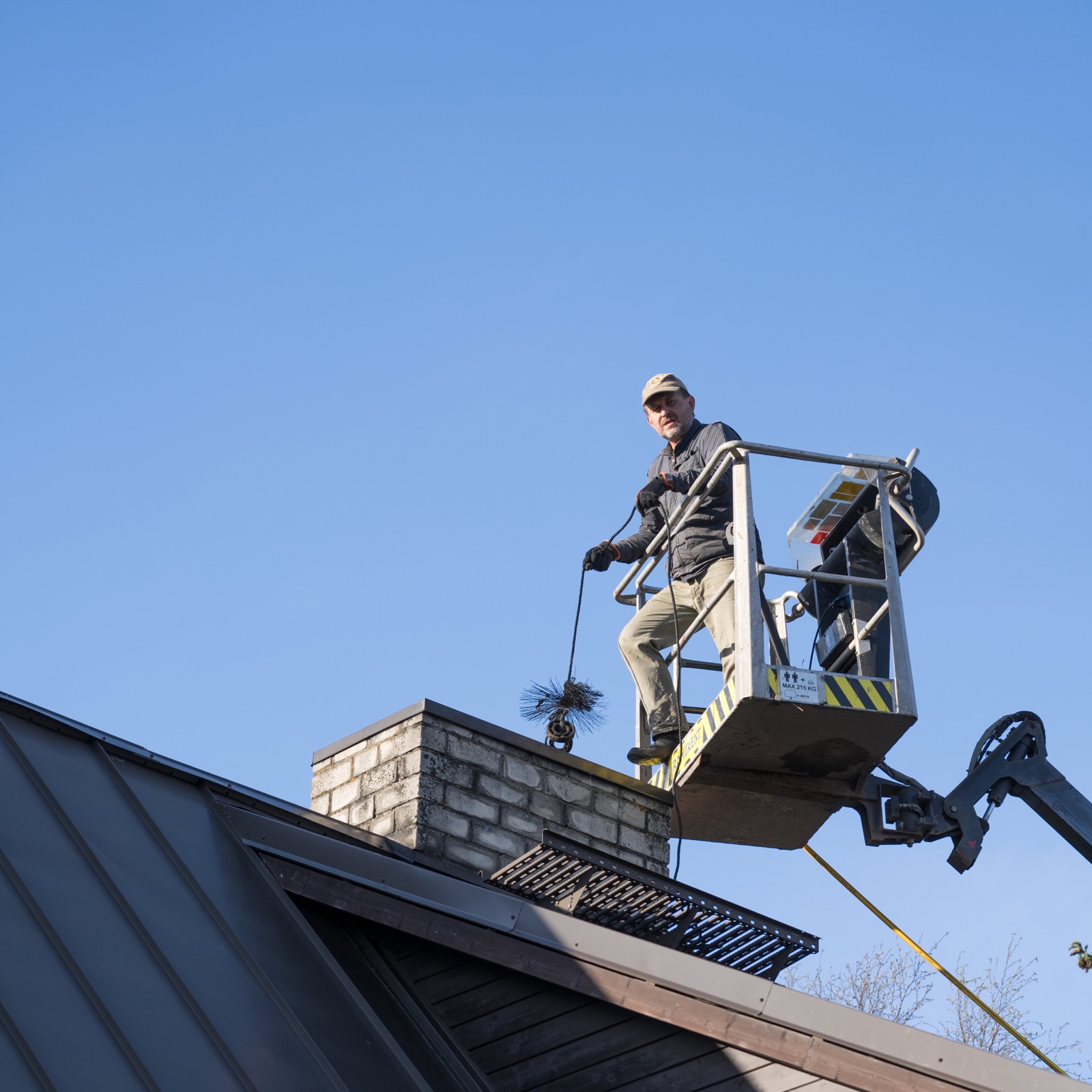 Chimney Sweeping service by Champs Chimney.